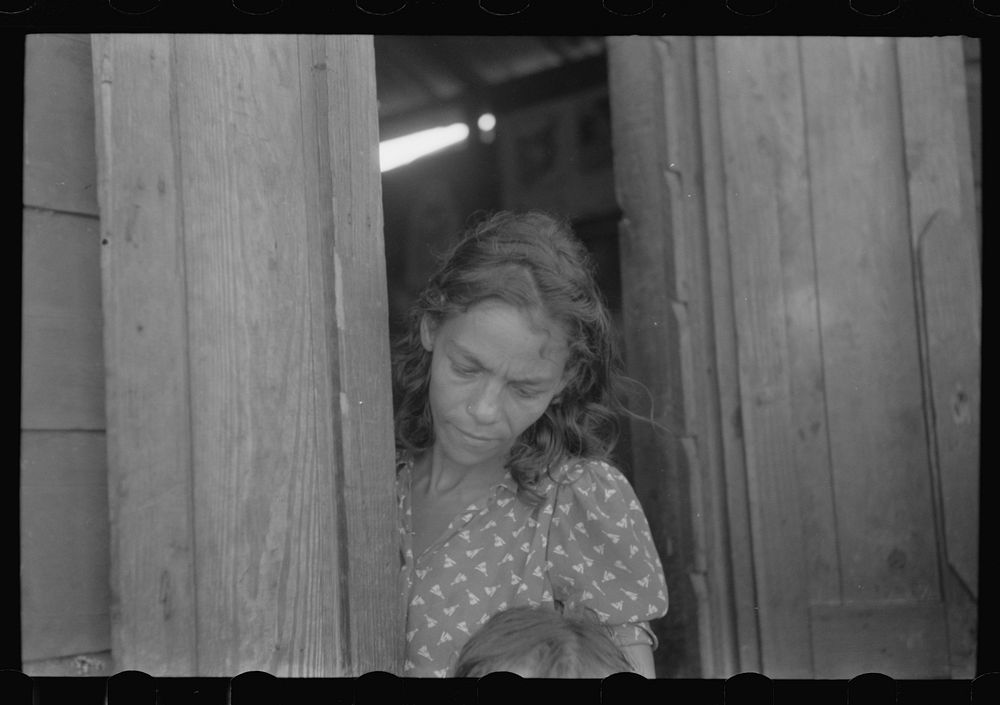 San Juan, Puerto Rico. Woman who lives in the slum area known as El Fangitto. Sourced from the Library of Congress.