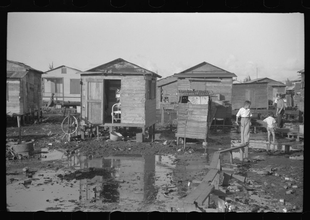 San Juan, Puerto Rico. Children in the slum area known as El Fangitto. Sourced from the Library of Congress.