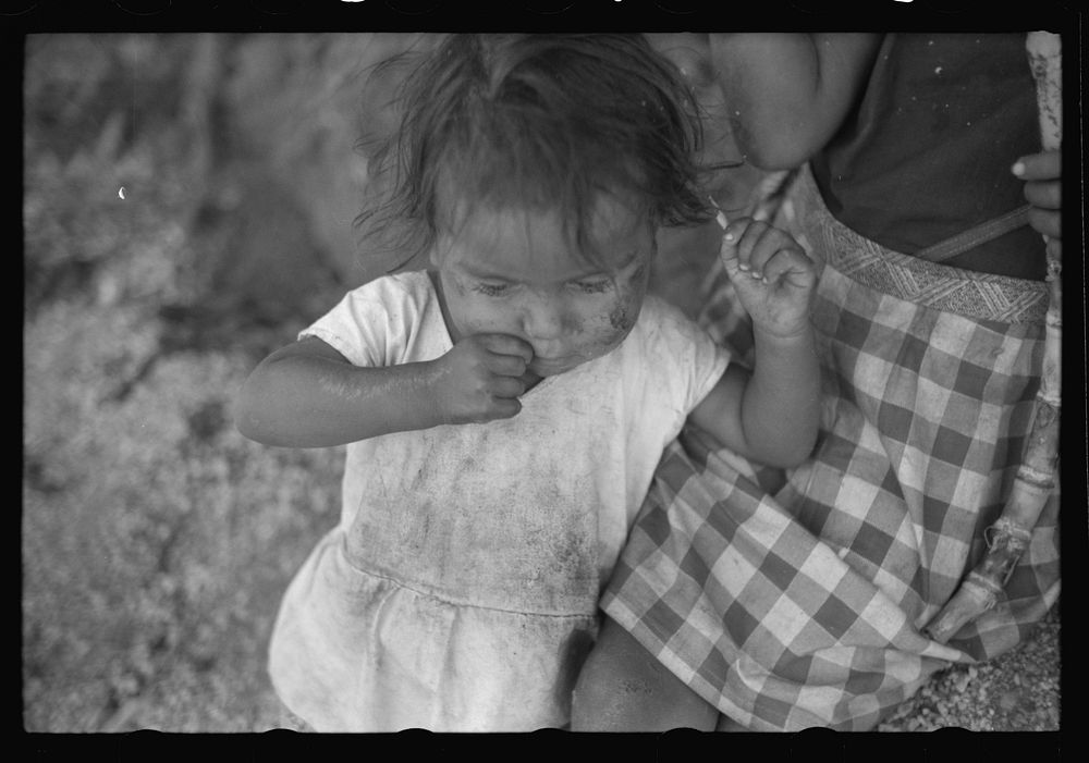 Farm laborer's child in the hills near Yauco, Puerto Rico. Sourced from the Library of Congress.