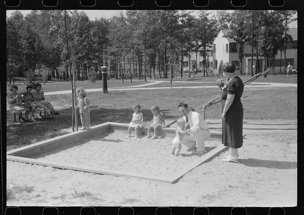 [Untitled photo, possibly related to: Family at Greenbelt, Maryland]. Sourced from the Library of Congress.
