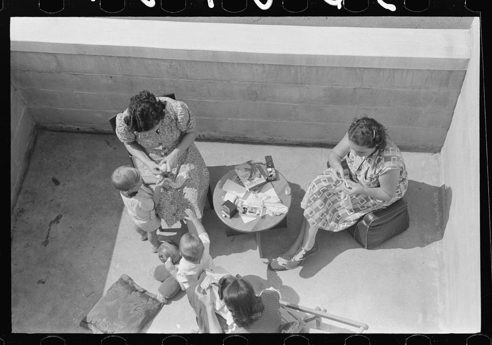 Family on terrace in Greenbelt, Maryland. Sourced from the Library of Congress.