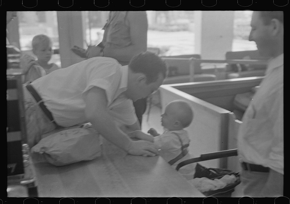 [Untitled photo, possibly related to: Shopping in coop store, Greenbelt, Maryland]. Sourced from the Library of Congress.