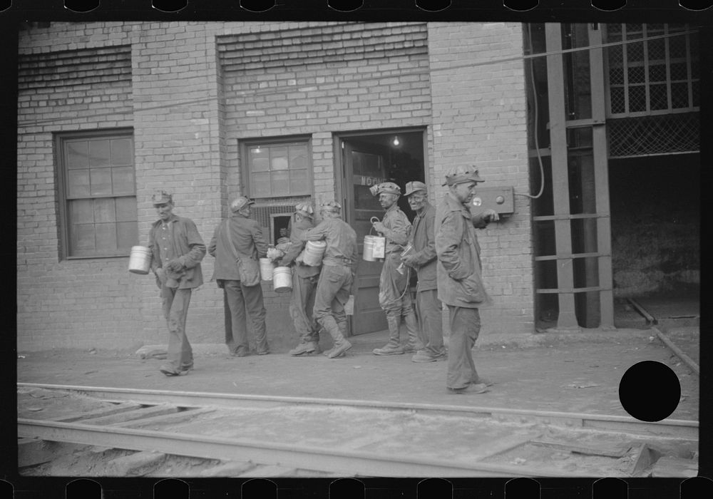 [Untitled photo, possibly related to: Miners turning in lamps and starting home. Caples, West Virginia]. Sourced from the…