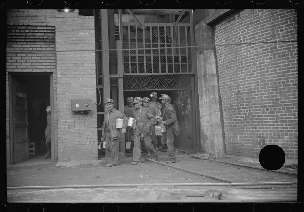 [Untitled photo, possibly related to: Miners turning in lamps and starting home. Caples, West Virginia]. Sourced from the…
