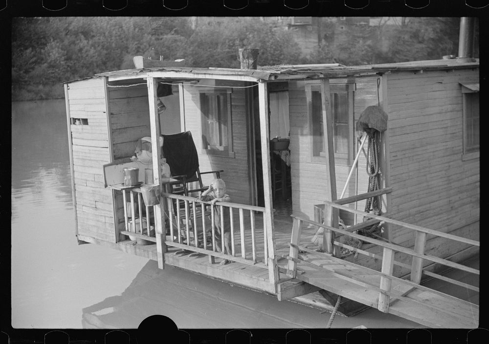 [Untitled photo, possibly related to: Family living on riverboat, Charleston, West Virginia. Husband now on WPA (Works…