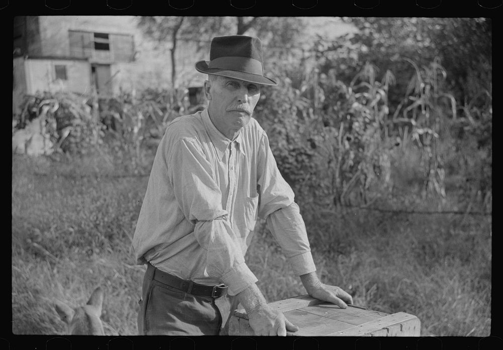 Man living in shack by river, Charleston, West Virginia. Sourced from the Library of Congress.