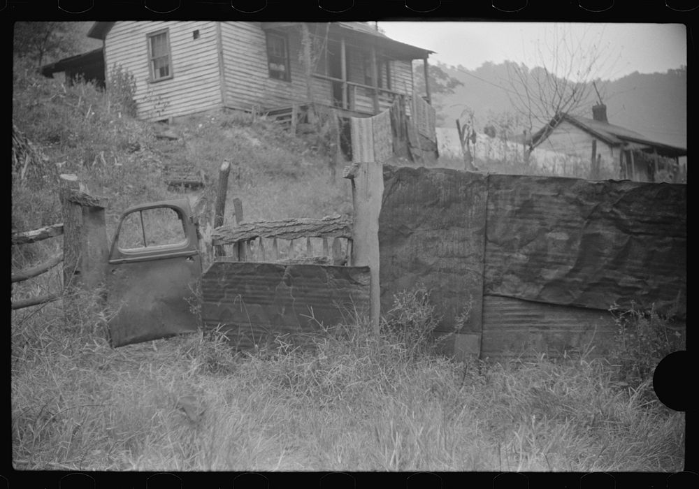 [Untitled photo, possibly related to: Fence gate in coal miner's front yard, Mohegan, West Virginia]. Sourced from the…