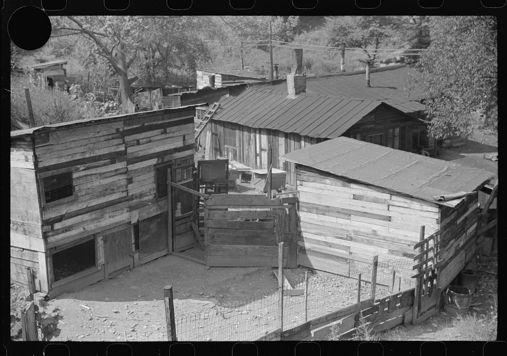 [Untitled photo, possibly related to: Rear view of Work Projects Administration worker's and old mine foreman's shacks and…