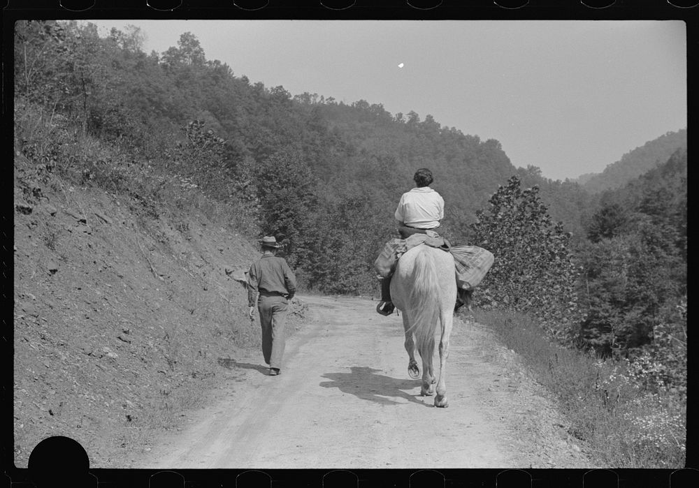 [Untitled photo, possibly related to: Miner and wife taking home provisions bought at company store, Caples, West Virginia].…