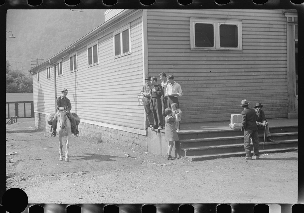 [Untitled photo, possibly related to: Miner taking home provisions, Caples, West Virginia]. Sourced from the Library of…