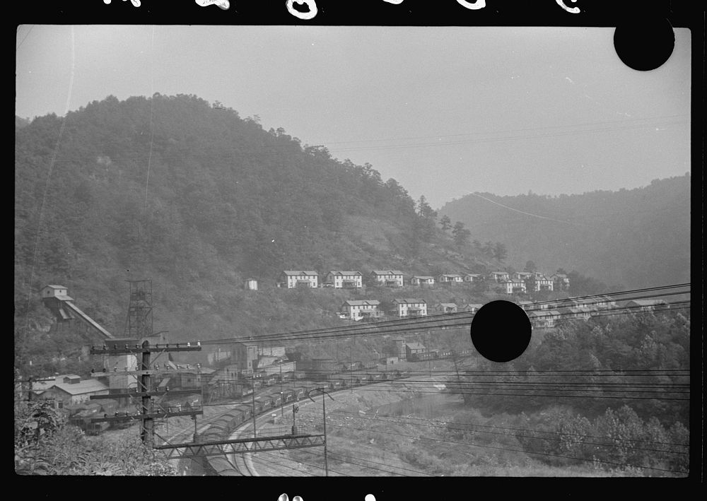 [Untitled photo, possibly related to: Caples, West Virginia. With coal mine tipple in foreground]. Sourced from the Library…