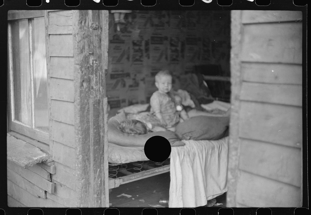 [Untitled photo, possibly related to: Children in bedroom of their home. Mother has TB, father is on WPA (Works Progress…