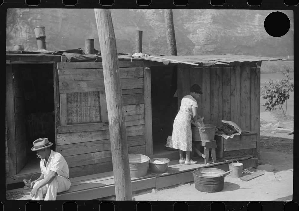 [Untitled photo, possibly related to: Playing checkers with bottle caps along highway between Charleston and Gauley Bridge…