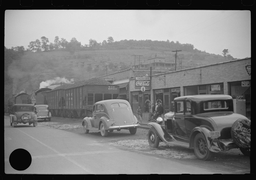 [Untitled photo, possibly related to: Train pulling coal through center of town morning and evenings, Osage, West Virginia].…