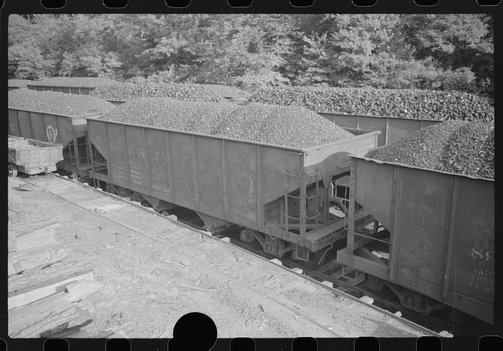 [Untitled photo, possibly related to: Coal cars, mining camp, Scotts Run, West Virginia]. Sourced from the Library of…