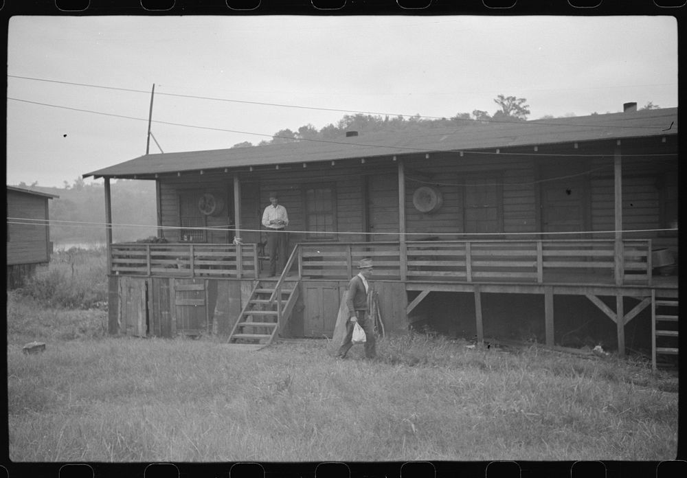 Coal miners' shanties by the river. Scotts Run, West Virginia. Sourced from the Library of Congress.
