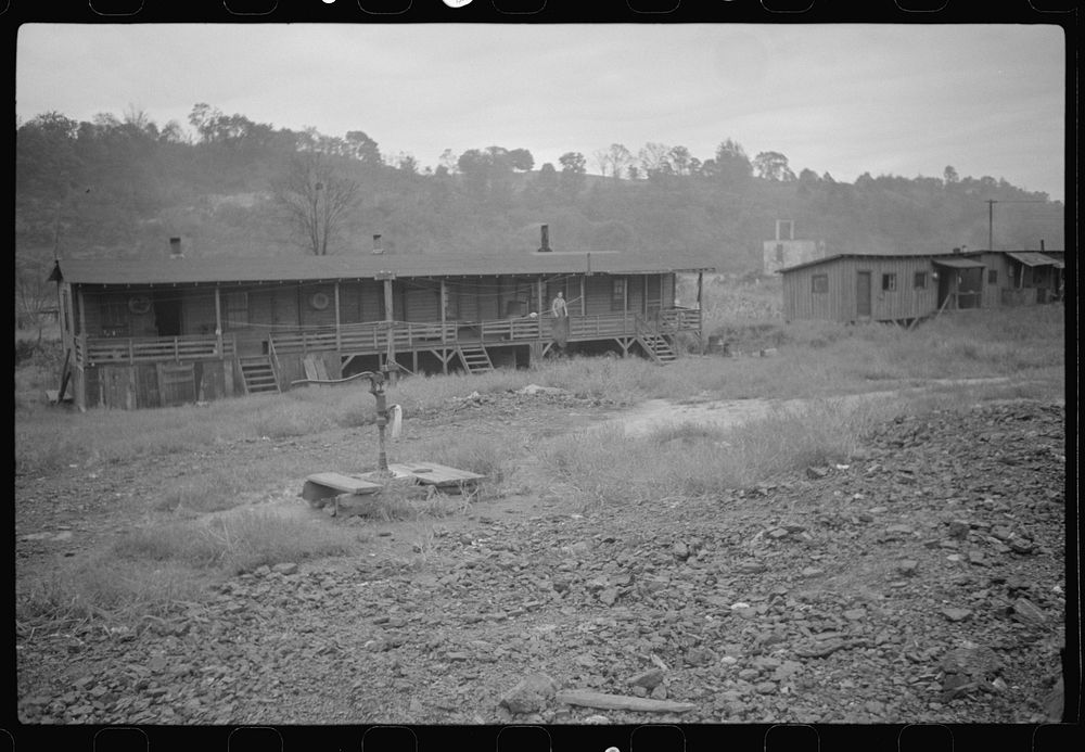 Coal miners' shanties by the river, West Virginia. Sourced from the Library of Congress.