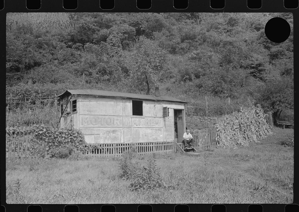 [Untitled photo, possibly related to: Unemployed miner's home he built. "It'll be purtier when I paint it." Scotts Run…