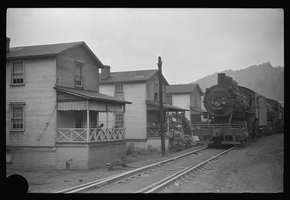 [Untitled photo, possibly related to: Train pulling coal through center of town morning and evenings, Osage, West Virginia].…
