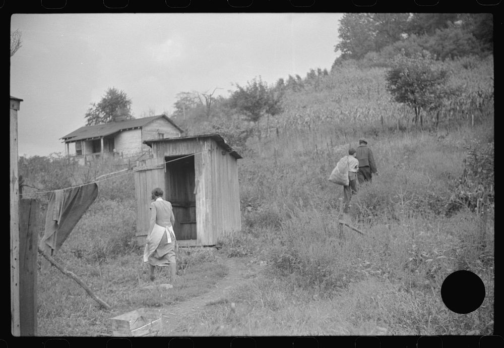 [Untitled photo, possibly related to: Neighbors take home slop for pig, also any extra corn. Bertha Hill, West Virginia].…