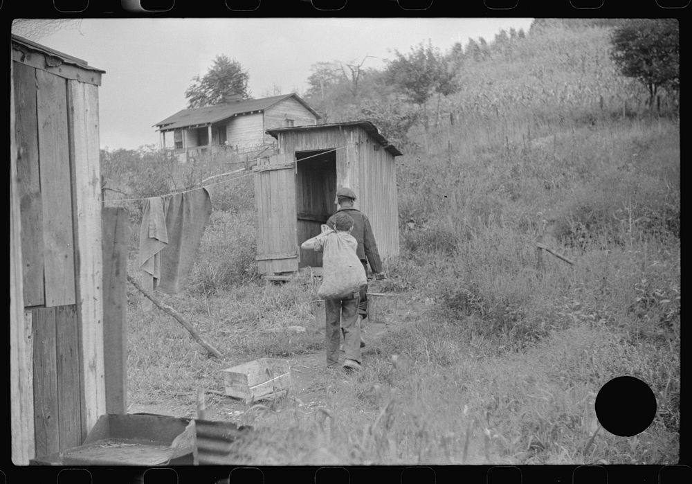 [Untitled photo, possibly related to: Neighbors take home slop for pig, also any extra corn. Bertha Hill, West Virginia].…