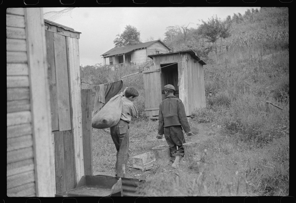 Neighbors take home slop for pig, also any extra corn. Bertha Hill, West Virginia. Sourced from the Library of Congress.