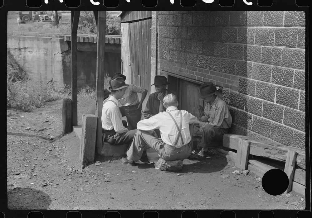 [Untitled photo, possibly related to: Card gambling in center of town, Osage, West Virginia]. Sourced from the Library of…