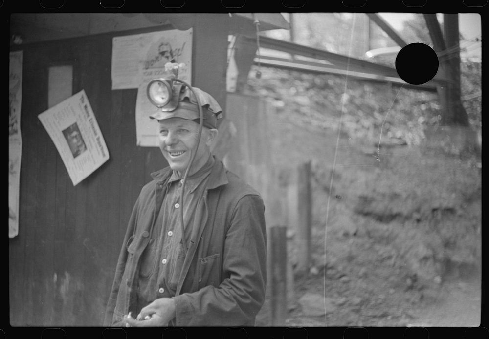 [Untitled photo, possibly related to: Coal miners waiting for next trip into the mine, Maidsville, West Virginia]. Sourced…