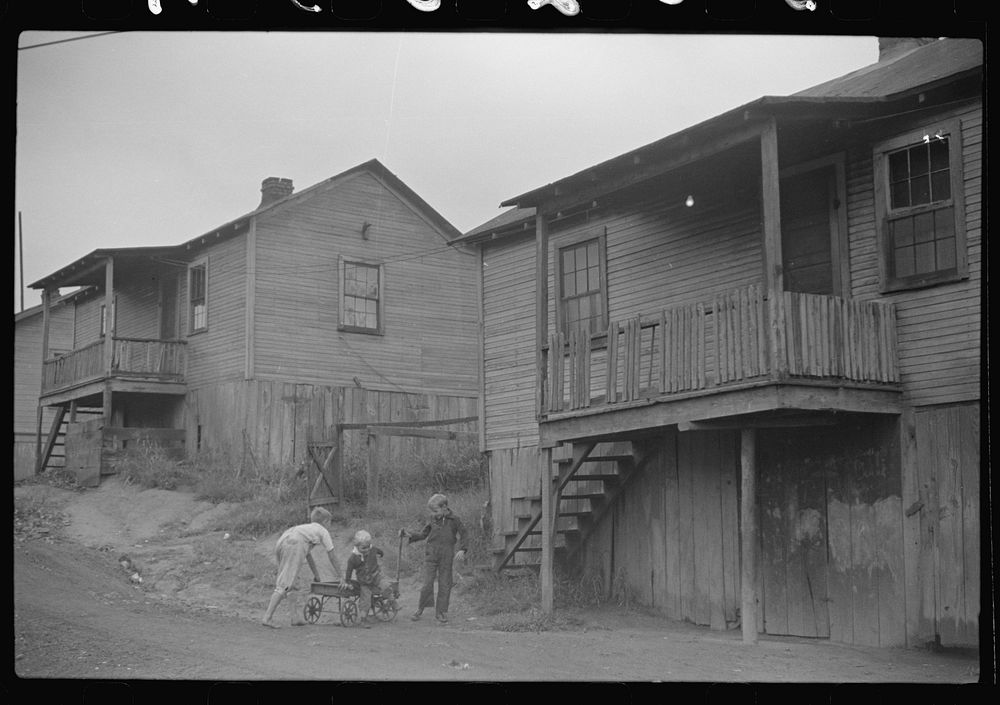Coal miners' children playing in front of their homes, Chaplin, West Virginia. Sourced from the Library of Congress.