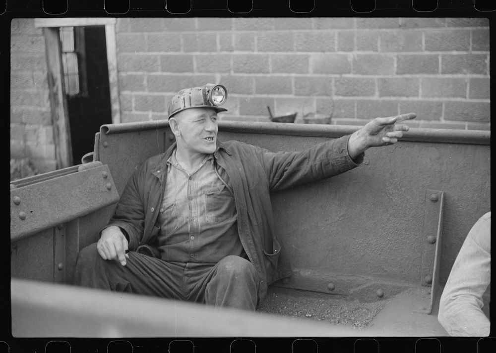 Coal miner waiting for car to go in on next trip, Maidsville, West Virginia by Marion Post Wolcott