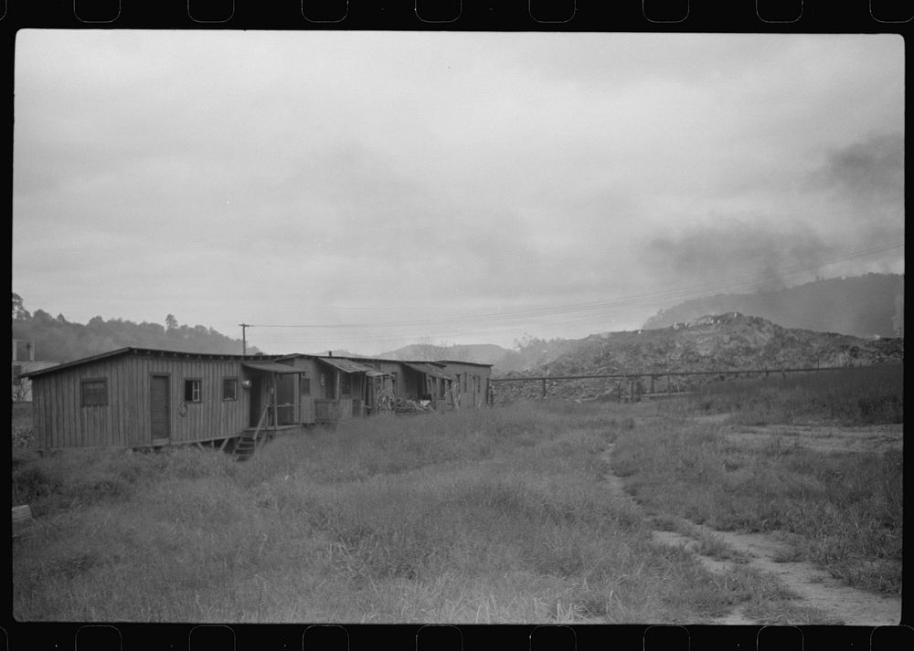 Section of Rosedale Mining Company. Shanties by the river (burning slag pile to right). These used to be United Mine Workers…