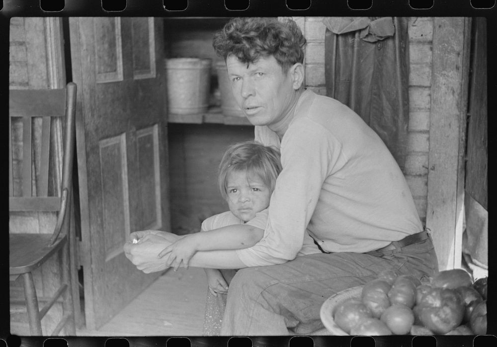 Mexican miner and child, Bertha Hill, Scotts Run, West Virginia. Sourced from the Library of Congress.