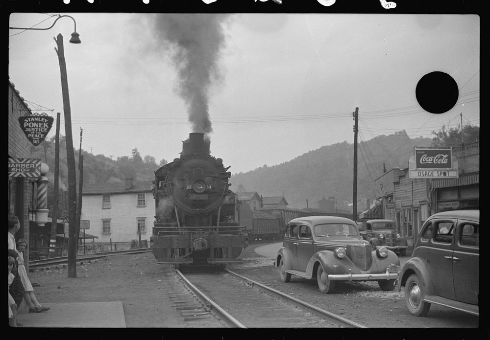 [Untitled photo, possibly related to: Train pulling coal through center of town morning and evening, Osage, West Virginia].…