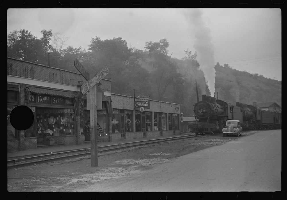 [Untitled photo, possibly related to: Train pulling coal through center of town morning and evening, Osage, West Virginia].…
