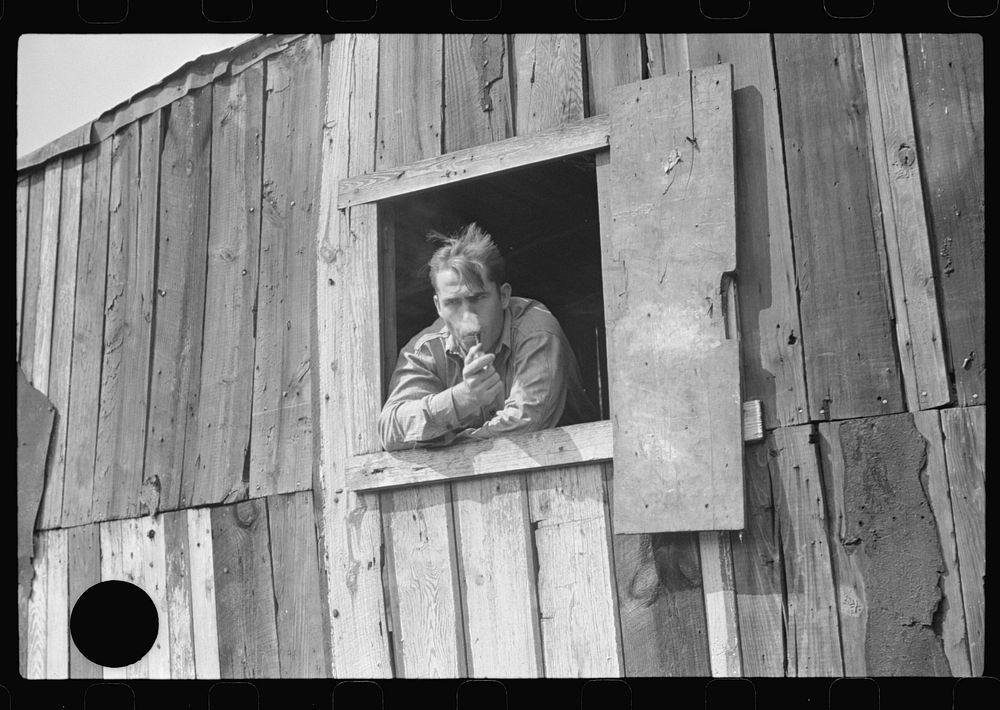 [Untitled photo, possibly related to: Coal miner looks out of window in his home, Bertha Hill, Scotts Run, West Virginia].…