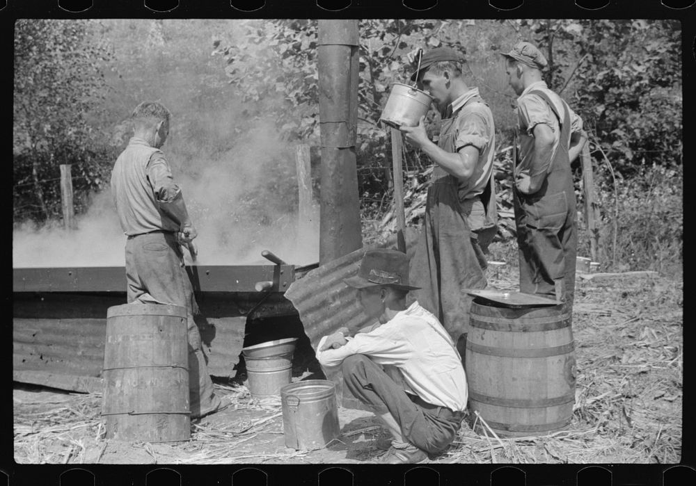 Racine, West Virginia. Making molasses is hot work. Sourced from the Library of Congress.