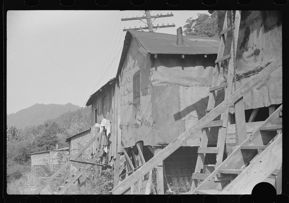 [Untitled photo, possibly related to: Shacks inhabited by es, along river on highway between Charleston and Gauley Bridge…