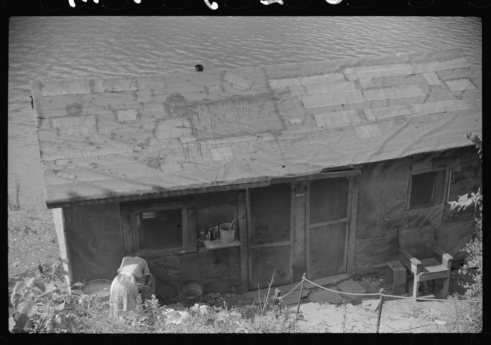 Shacks inhabited by es, along river on highway between Charleston and Gauley Bridge, West Virginia. Sourced from the Library…