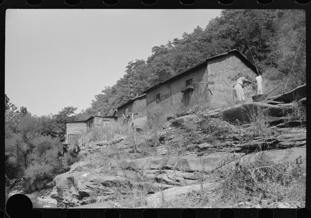 [Untitled photo, possibly related to: Shacks inhabited by es along river on highway between Charleston and Gauley Bridge…
