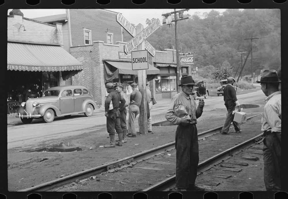 [Untitled photo, possibly related to: Coal miners waiting for bus to go home, Osage, West Virginia]. Sourced from the…