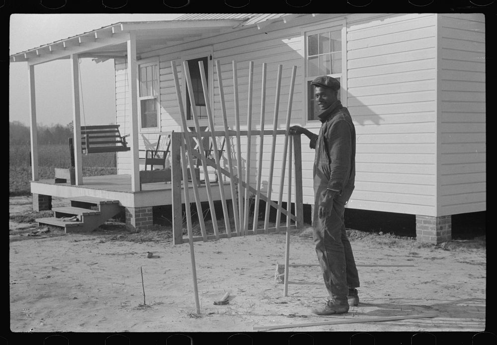 [Untitled photo, possibly related to: FSA (Farm Security Administration) borrower building a new gate for his yard. Prairie…