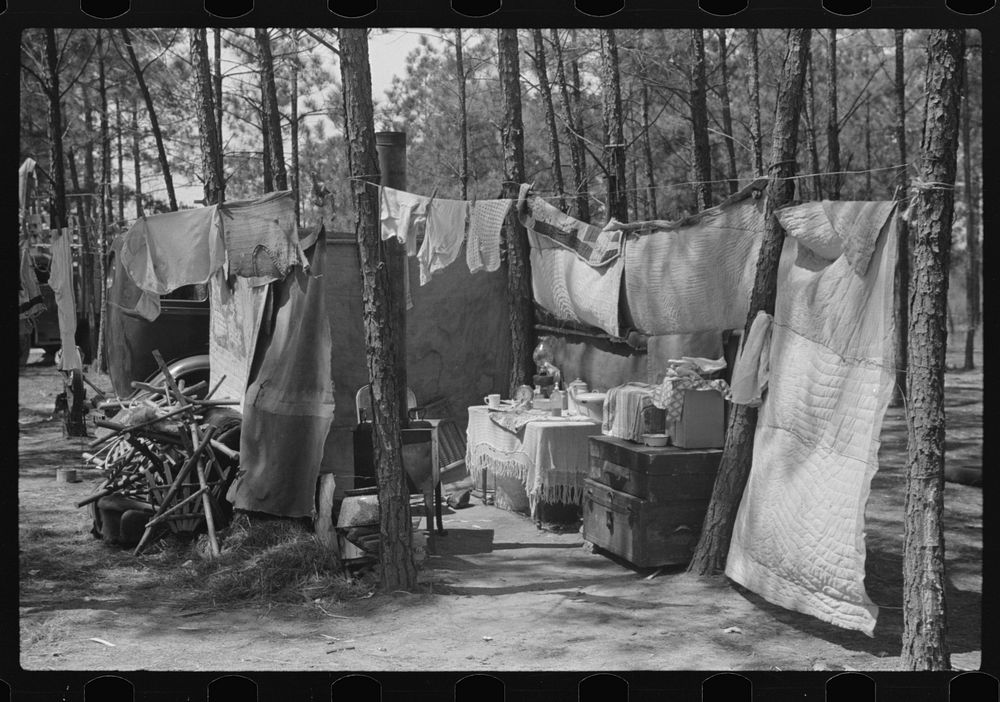 Home of one of two families who travel and work together all through the South, repairing stalls, stoves, tools, houses, and…