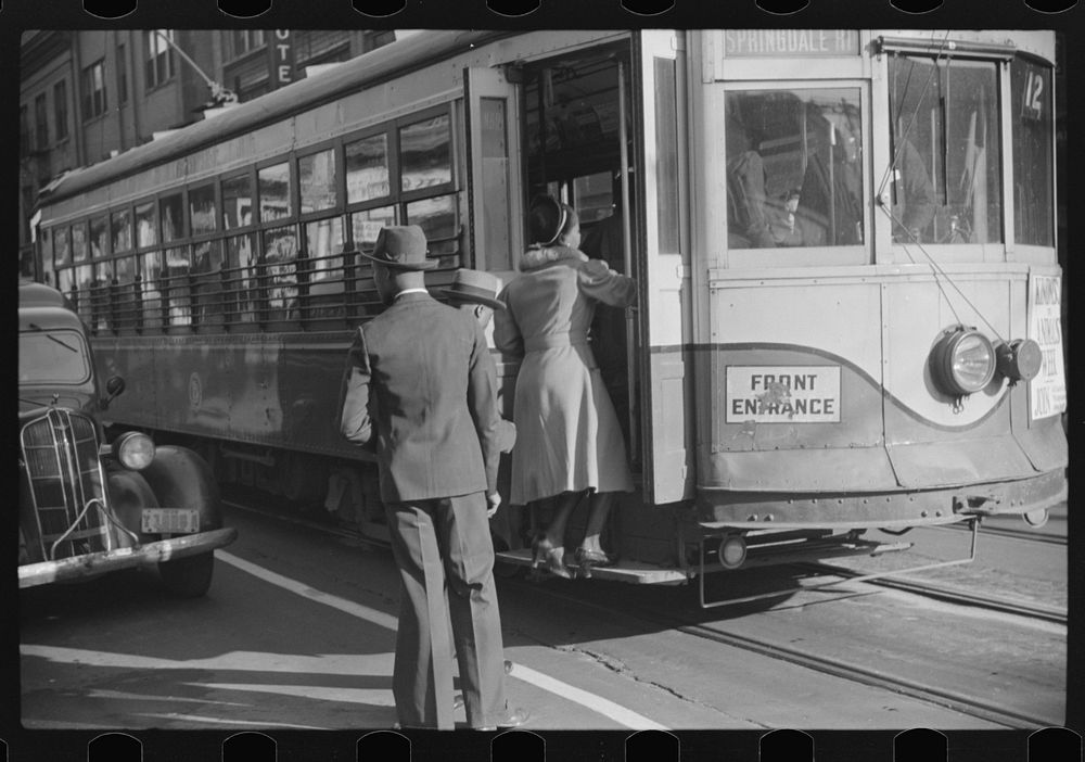 Domestic help boarding streetcar, Atlanta, Georgia. Sourced from the Library of Congress.