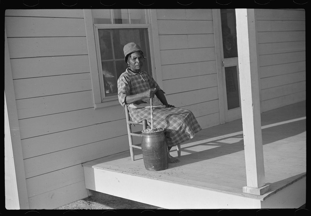 [Untitled photo, possibly related to: Gertrude, churning on Isaiah Pettway's porch, Gees Bend, Alabama]. Sourced from the…