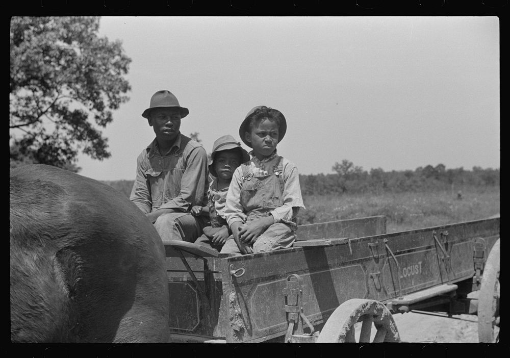 [Untitled photo, possibly related to: Project family in new wagon, Flint River Farms, Georgia]. Sourced from the Library of…