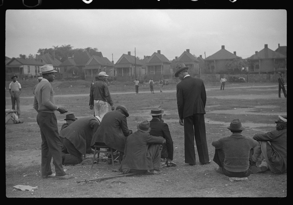 [Untitled photo, possibly related to: Atlanta, Georgia. Watching a baseball game]. Sourced from the Library of Congress.