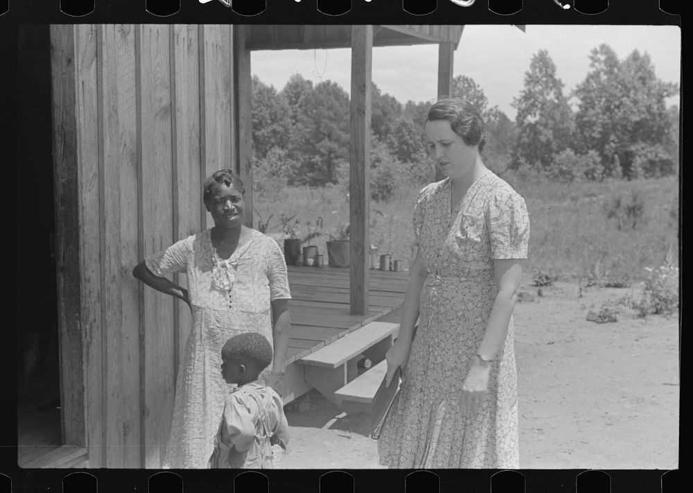 [Untitled photo, possibly related to: FSA (Farm Security Administration) home management supervisor pointing out to…