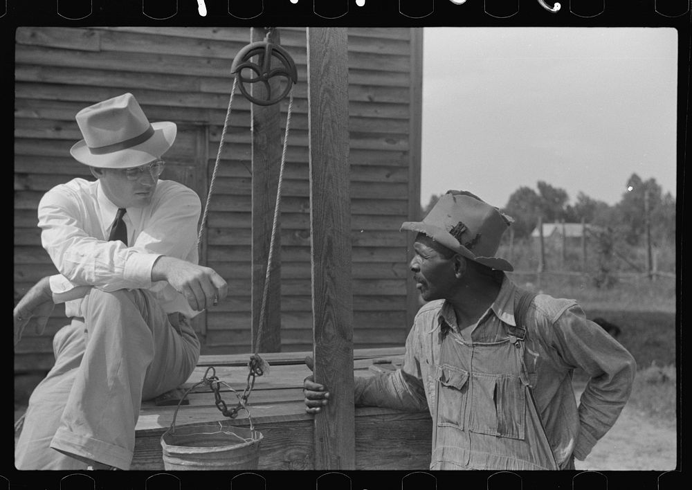[Untitled photo, possibly related to: FSA (Farm Security Administration) supervisor inspecting rehabilitation borrower's…