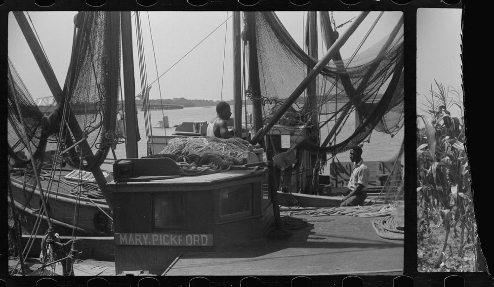 [Untitled photo, possibly related to: Fishing boats off St. Helena Island, South Carolina]. Sourced from the Library of…