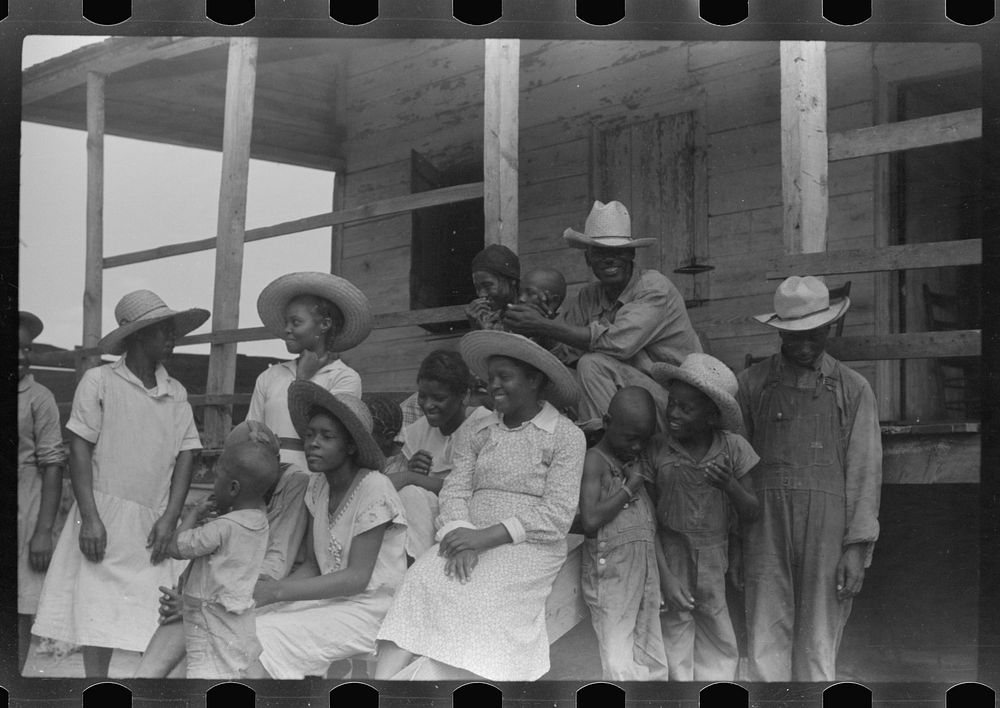 [Untitled photo, possibly related to: Public health doctor giving tenant family medicine for malaria, near Columbia, South…